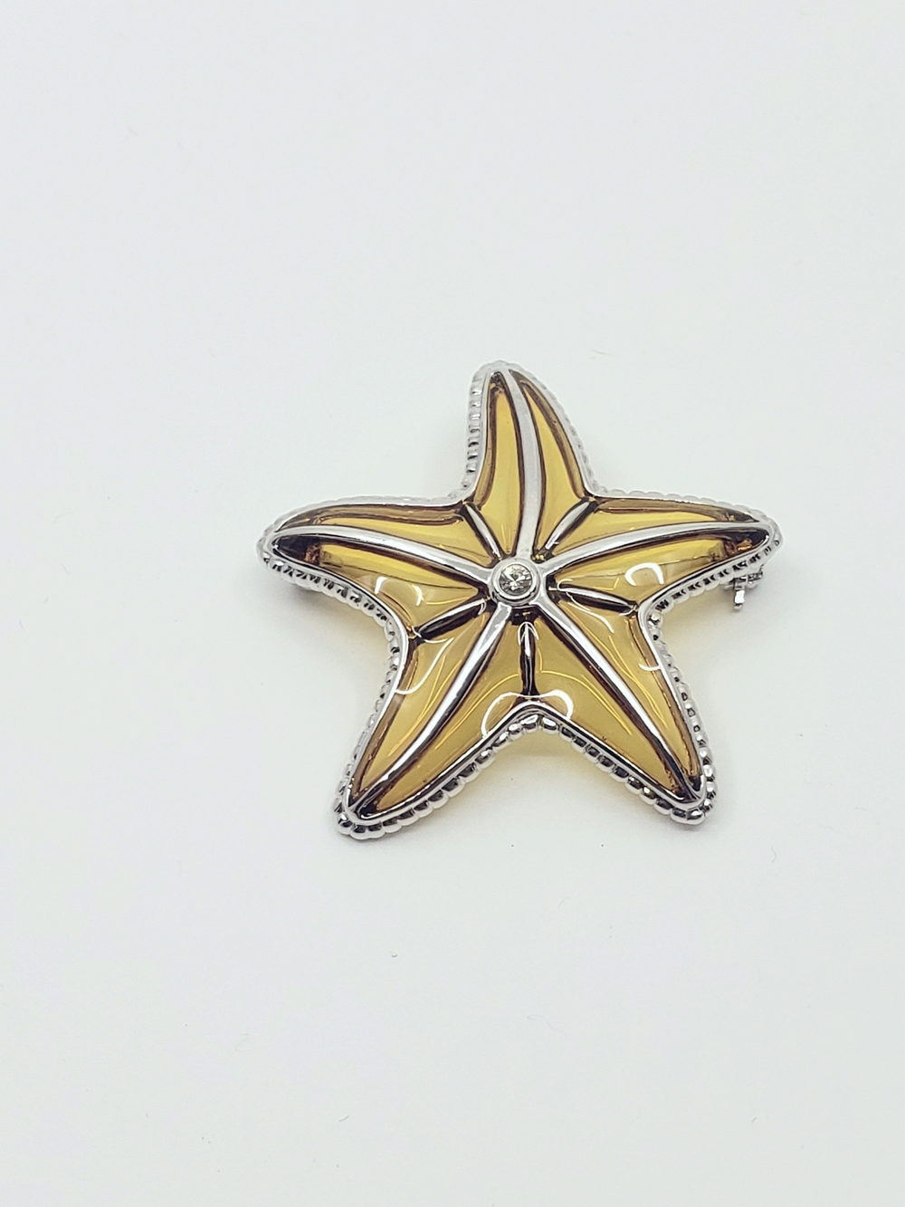 C4002 Transparent Starfish Acryclic Brooch Yellow/Tan Rhinestone Center 1.5"